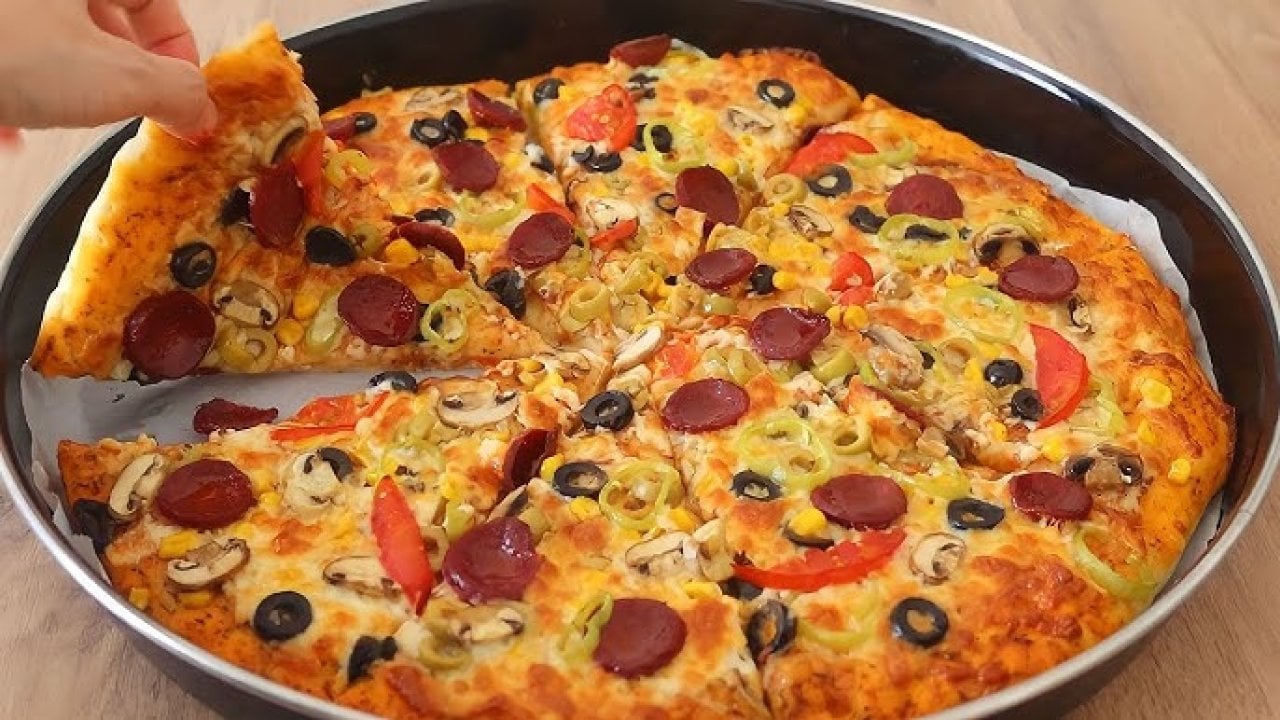 Pizzacılara taş çıkaracağınız lezzet tüyosu; Evde pizza yapmanın püf noktası
