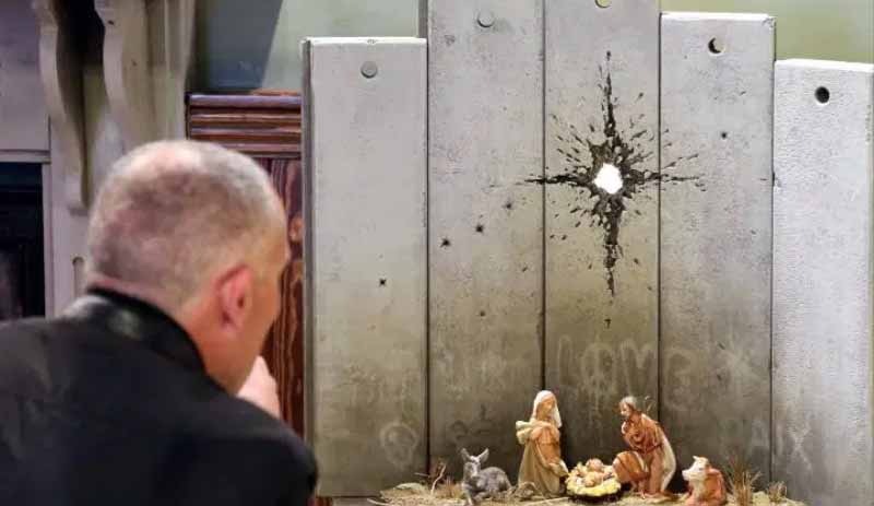 Banksy Batı Şeria'da: Ayrım duvarı önünde doğan İsa