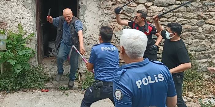 Çöp evini temizlemeye gelen ekibe direndi, polisi bıçakladı